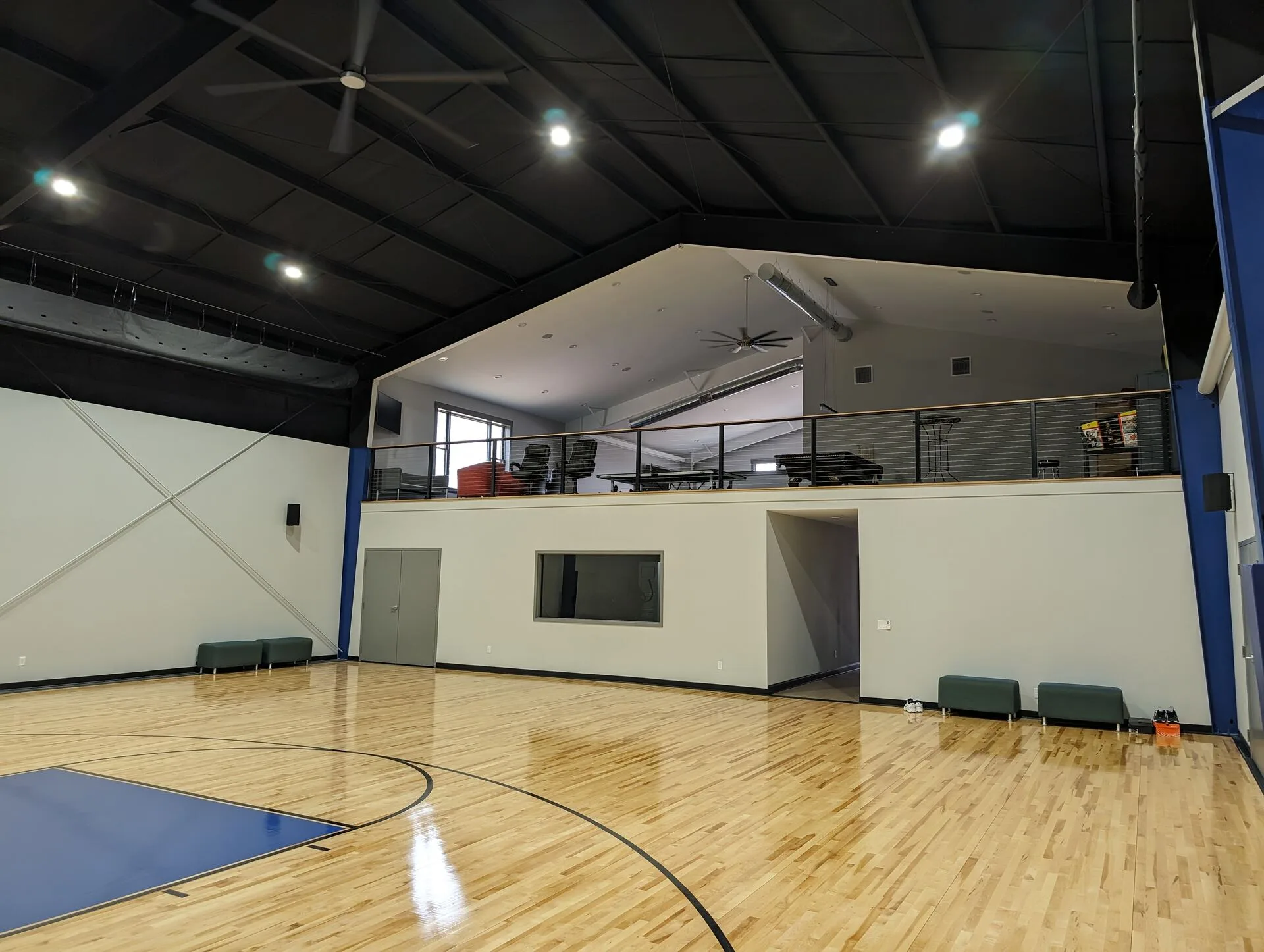Private indoor basketball court — luxury amenity wing by Harber Built